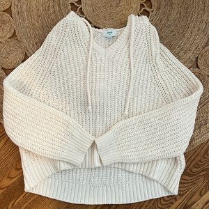 Knitted sweater with hood